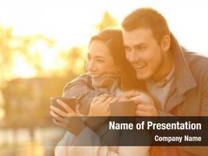 Young Couple Looking To The Future PowerPoint Template