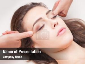 Face woman acupressure massage closeup