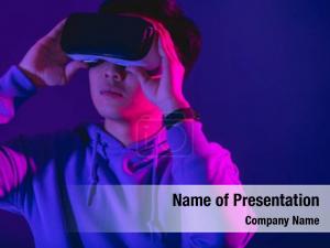 Excited Guy Using a VR Headset PowerPoint Template
