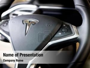 Steering tesla logo wheel inside PowerPoint Template