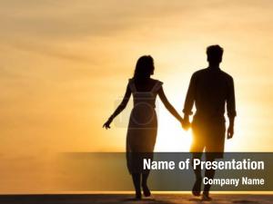 Couple Walking To Sunset PowerPoint Template