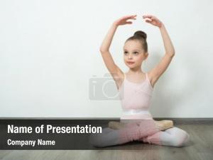 Young little adorable ballerina does