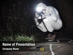 Photographing forensics researcher blood stained