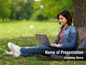 Student With Laptop Free PowerPoint Template
