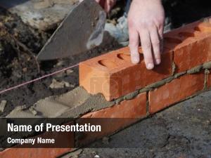Laying construction worker bricks showing