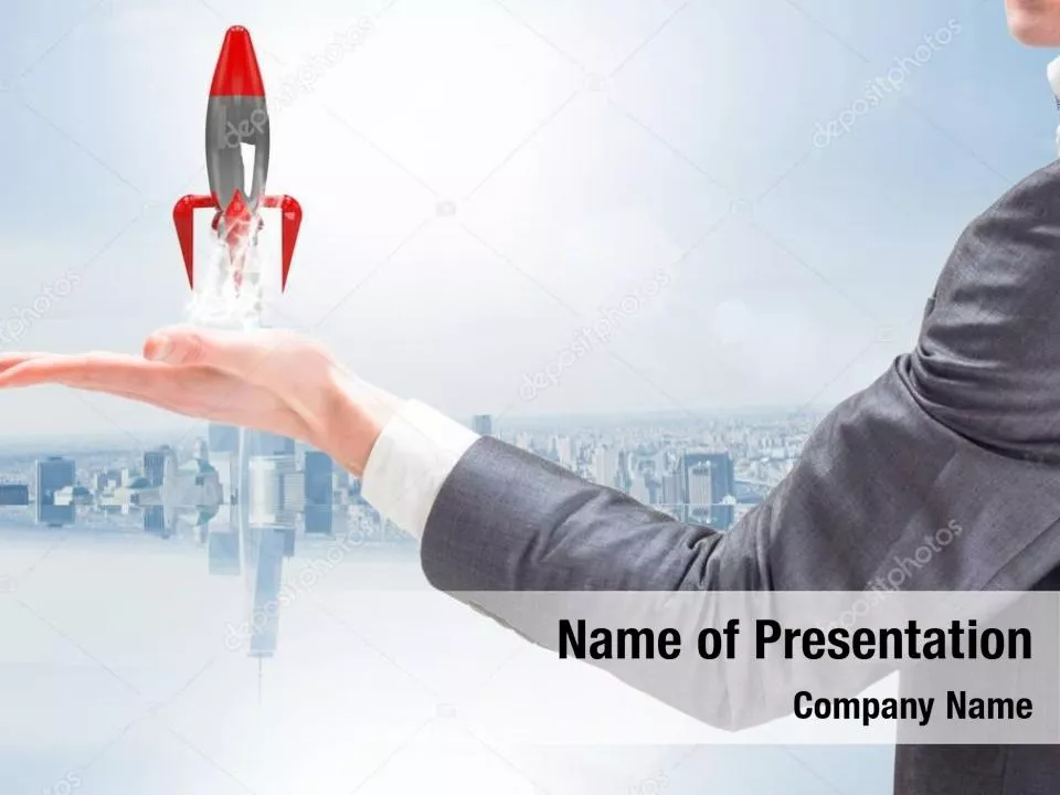 Hand of a Businessman Holding a Toy Rocket