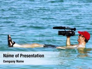 Isr dead sea, sep 27:cameraman PowerPoint Template