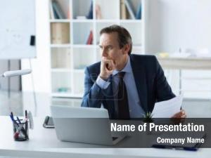 Businessman At Work PowerPoint Template