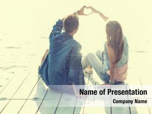 Sitting couple love pier, their PowerPoint Template