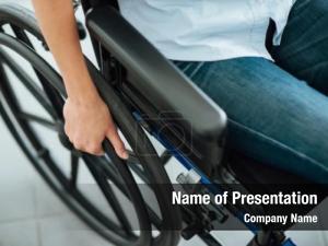 Hand woman wheelchair wheel close PowerPoint Template