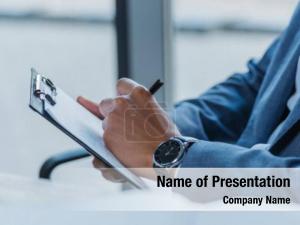 Businessman Writing on Clipboard PowerPoint Template