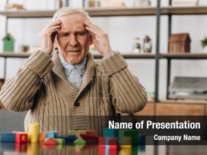 Headache pensioner having while sitting PowerPoint Template