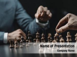 Businessmen cropped shot playing chess PowerPoint Template