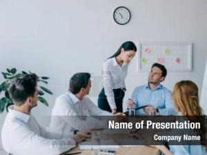 Coworkers group business having business PowerPoint Template