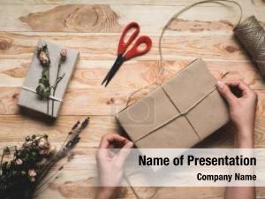 Woman top view decorating christmas PowerPoint Template