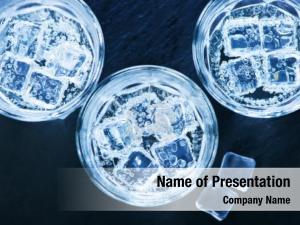 Glass Of Cold Water With Ice Cubes PowerPoint Template