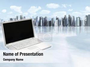 Laptop on Cityscape Background