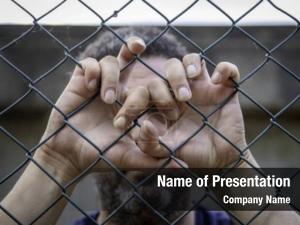 Prison Cell With Prisoner PowerPoint Template