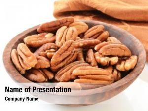 Shelled wooden bowl pecan nuts