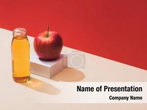 Bottle fresh juice near apple PowerPoint Template