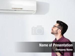 Looking young businessman air conditioner