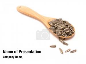Sunflower seeds in a wooden spoon