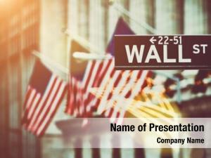 Wall street sign in New York with New York Stock Exchange  