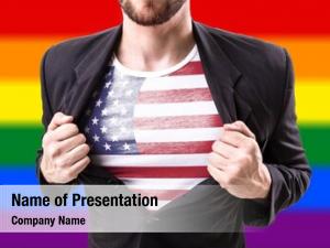 Businessman stretching suit with USA flag with rainbow flag