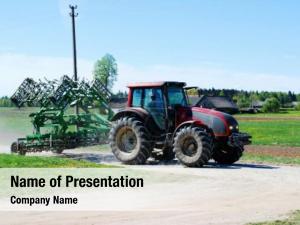 Huge tractor in the field - In a nice blue sunny day PowerPoint Template