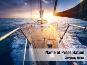 Deck sunset sailboat while cruising