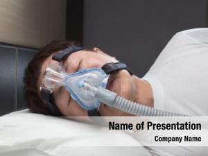 Apnea man sleeping cpap machine