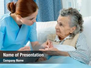 Elderly nurse cares woman lying