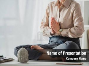 Businesswoman cropped view meditating lotus