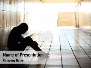 Depressed backlight teenager sitting inside PowerPoint Template