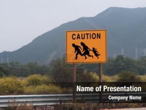 Showing highway sign family crossing PowerPoint Template