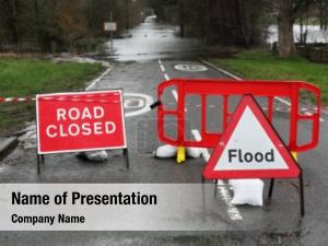 Sign warning traffic flooded road