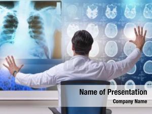 Looking male doctor mri scans PowerPoint Template