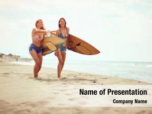 Beach surfers women having fun