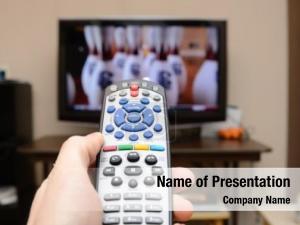 Foreground television remote selective focus PowerPoint Template