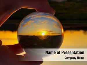 Crystal Globe In Hand PowerPoint Template