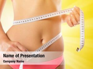 Measuring slim girl her waist,