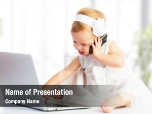 Small Baby with Laptop PowerPoint Template