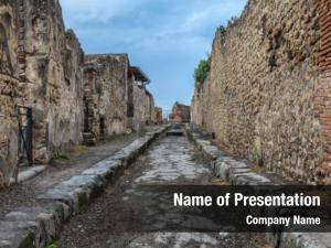 Ruins paved street city pompeii