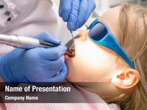 Dental dentist performing filling procedure
