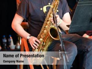 Saxophone musician playing live concert
