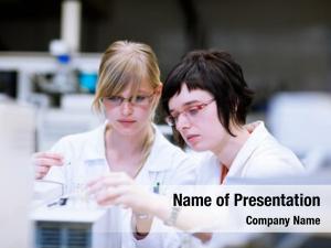 Researchers/chemistry two female students doing