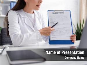 Doctor cropped view pointing medical PowerPoint Template