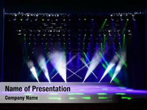 Stage Illuminated by Spotlights PowerPoint Template