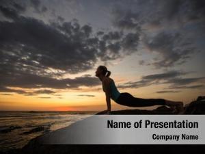 Doing yoga woman exercises seashore
