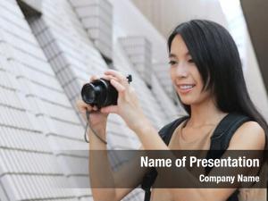 Photo woman taking digital camera